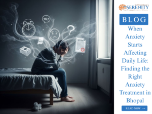 Person sitting on a bed feeling stressed and overwhelmed, representing anxiety and mental health challenges related to anxiety treatment in Bhopal.